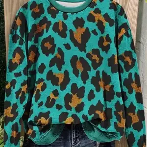 TURQUOISE ANIMAL PRINT PULLOVER