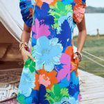 MULTI-COLORED FLORAL DRESS WITH FLUTTER SLEEVES WITH POCKETS
