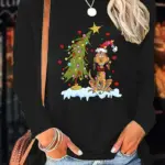 GRINCH CHRISTMAS GRAPHIC TEE