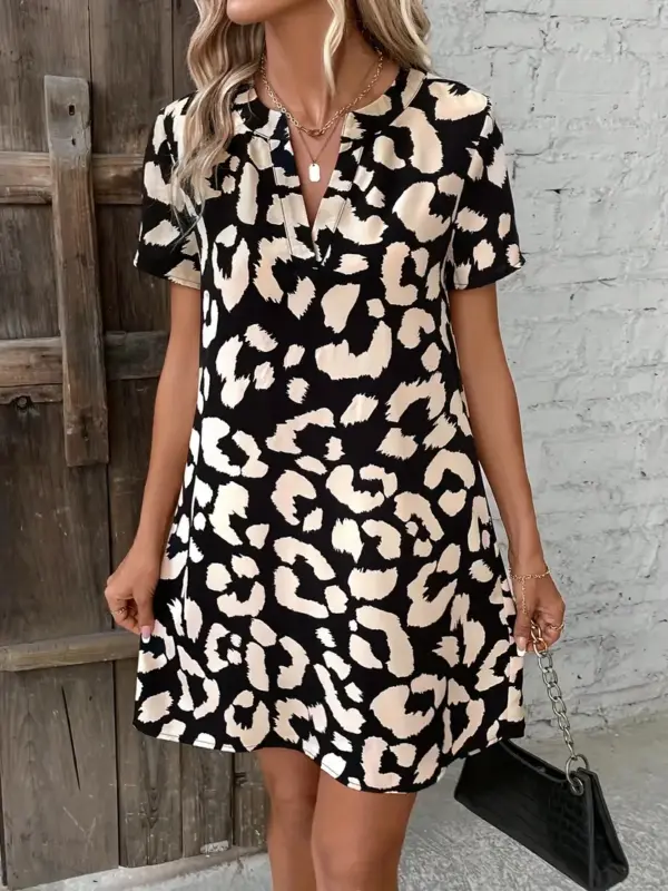 BLACK AND CREAM ANIMAL PRINT DRESS