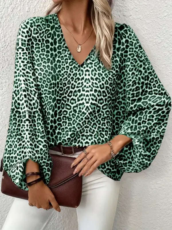 GREEN AND BLACK ANIMAL PRINT TOP WITH LANTERN SLEEVES
