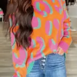 ORANGE AND HOT PINK ANIMAL PRINT SWEATER
